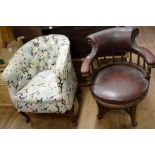 A late Victorian office type armchair, a tub armchair,