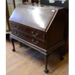 An inlaid bureau on stand, 91.