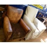 An early 20th century leather upholstered club armchair,