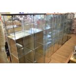 Ten Ikea Detolf glass display cabinets, with doors and removable shelves, 42.