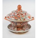 A Chinese porcelain two handled bowl and cover, decorated flowers,