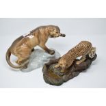 A Beswick Puma on Rock, tawny, 1702, gloss, and a Cheetah on Rock, 2725,