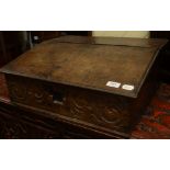 An 18th century carved oak bible box, 57 cm wide Condition report Later hinges,