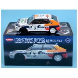 A Kyosho 1:18 scale die-cast model Lancia Delta HF EVO2 REPSOL No 3, and six other model rally cars,