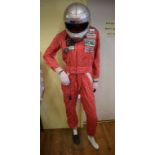 A set of Alan Matthew's Nomax racing overalls, having Champion, Shell,