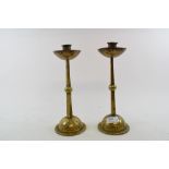 A pair of WMF brass candlesticks, of square tapering form on round bases,