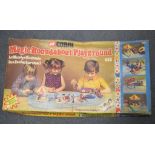 A Corgi Magic Roundabout Playground, 8853, incomplete, a Toyland Toy Mechanical Drummer Bear, boxed,