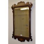 A George III style inlaid mahogany wall mirror, 56 cm wide,
