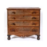 An early 19th century mahogany chest, inlaid with boxwood stringing,