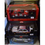 A Sun Star 1:18 scale die-cast model Ford Escort Mk II, and seven other model rally cars,