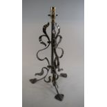 An Art Nouveau style wrought iron lamp base,