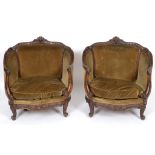 A walnut three piece suite, carved face masks, acanthus leaves and scrolls,