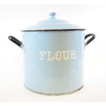 A light blue enamel flour bin,