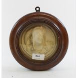 A plaster head and shoulders portrait roundel, of a lady, in a mahogany frame,