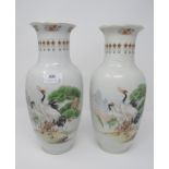 Two Chinese Republic period porcelain vases, decorated cranes,