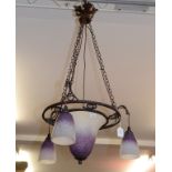 A Charles Schneider wrought iron and coloured glass 4 light chandelier, decorated flowers,
