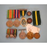 A pair of WWI medals, awarded to Capt A L Gresson RN, his telescope, a group of three medals,