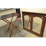 An oak wall mirror, formed of a pair of oak panel doors, 101 cm wide, and a mahogany tray,