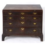 An 18th century oak chest, with a brushi