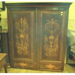 A mahogany cabinet, having a pair of doo