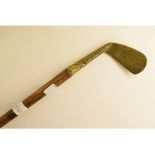 A brass handled golf Sunday stick, circa