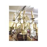 An 18th century style brass eleven light