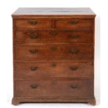 A George III oak chest, of two short and