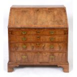 An 18th century bureau, veneered in waln