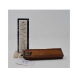 A 19th century travel thermometer, in a