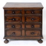 A 17th century style oak chest, of four