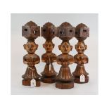 A set of four carved wood Charpoy legs,