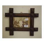 A Tramp Art picture frame, 26.5 x 31 cm