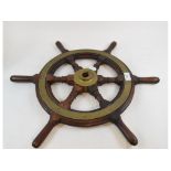 A mahogany and brass ship's wheel, 56.5