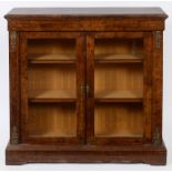 An inlaid walnut pier cabinet, with gilt