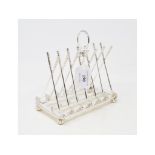 A plated golf club toast rack, 16 cm lon