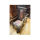 A pair of oak carver chairs, the top rai