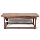 An oak refectory table, the four plank t