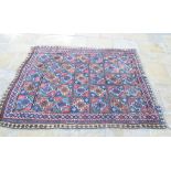 A Persian compartment rug, 180 x 144 cm