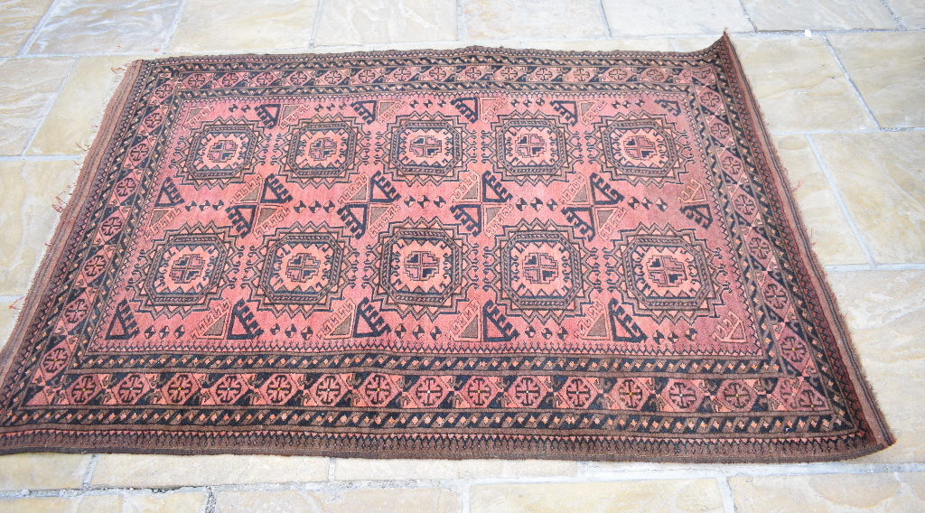 An Afghan rug, decorated elephant ghuls