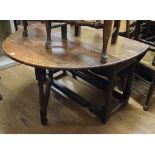 An oak gateleg table, 141.5 cm wide