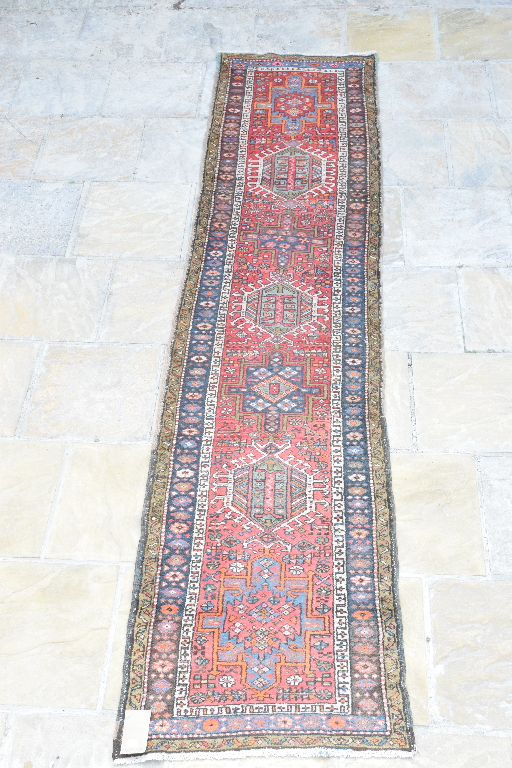 A Persian Heriz runner, with geometric m