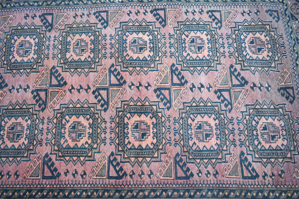 An Afghan rug, decorated elephant ghuls - Image 2 of 3