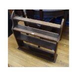 A set of hardwood hanging wall shelves,