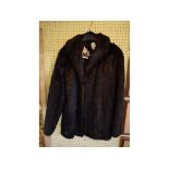 A lady's mink fur short jacket, bears a