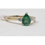An 18ct white gold, emerald and diamond