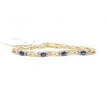 A 14ct yellow and white gold bracelet, s