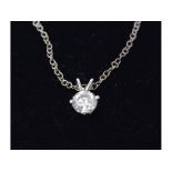 A 14ct white gold and solitaire diamond