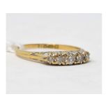 An 18ct gold and diamond ring, approx. r