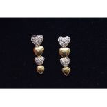 A pair of 14ct gold graduated heart drop