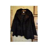 A lady's black fur jacket